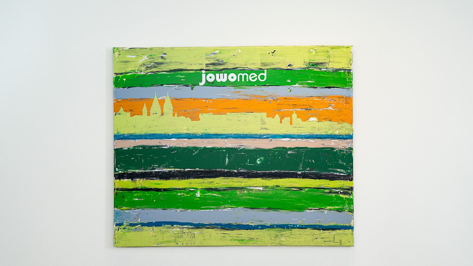 Kunstwerk mit Mainzer Skyline in der Hausarztpraxis Jochen Wolf & Kollegen am Schillerplatz